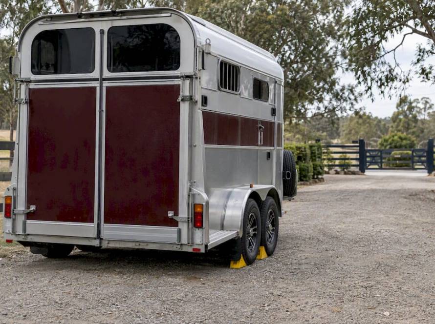 Horse float parked securely on level gravel